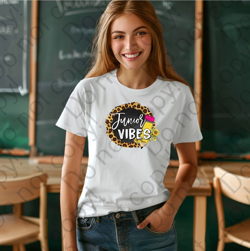 08-126 Junior Vibes with a pencil and a cheetah print background Completed Tee