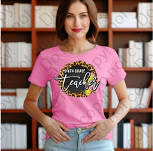 Load image into Gallery viewer, 08-137 Sixth grade teacher with a pencil and a cheetah print background Completed Tee
