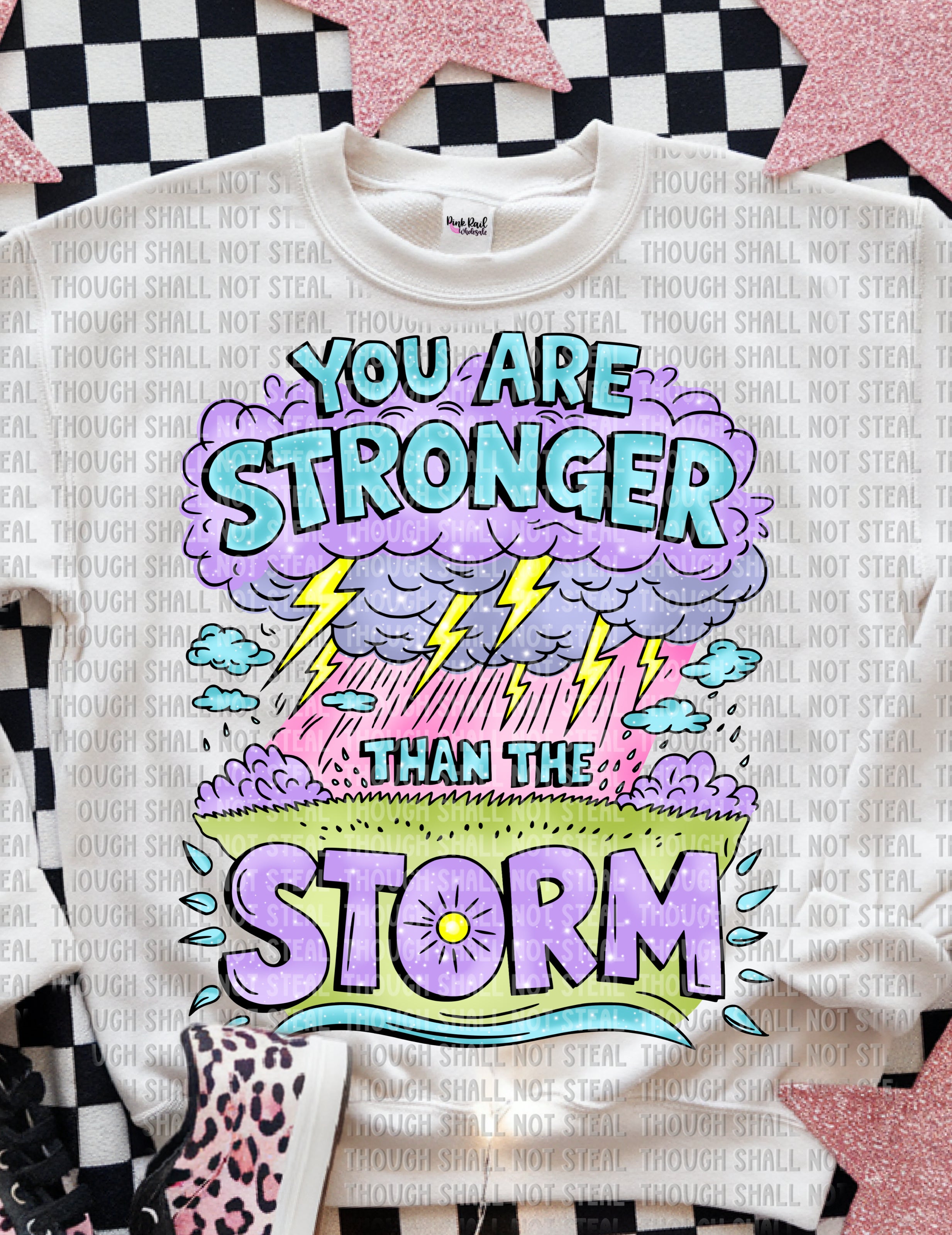 26-141 Stronger_than_the_storm_with_sparkles DTF TRANSFER ONLY